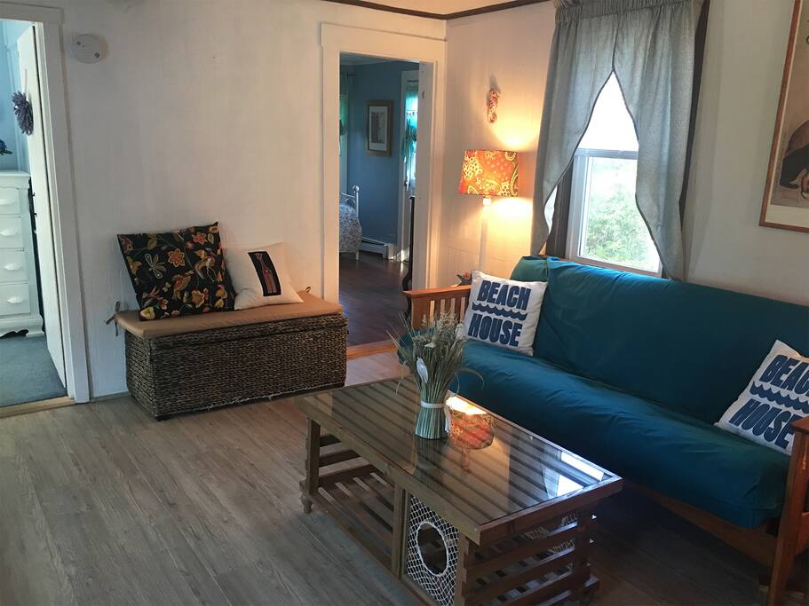 Living room with views of master bedroom and second bedroom