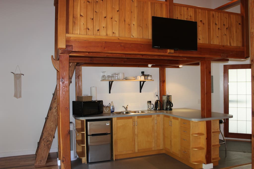 Smart TV mounted to the loft. We provide Netflix.
