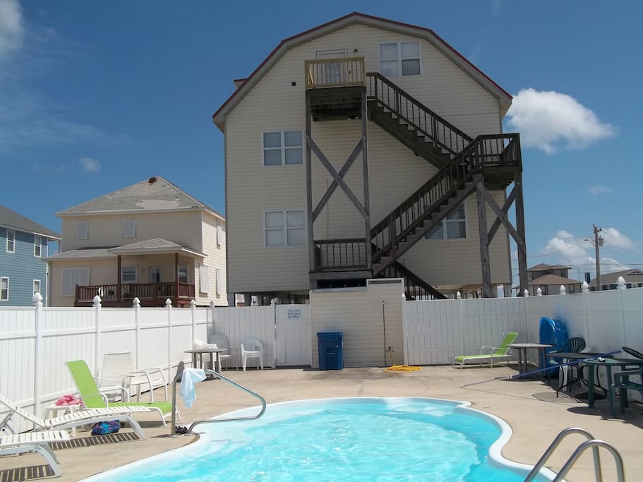 Back of house. Separate entrance to apartment or use inside stairs. Private pool!