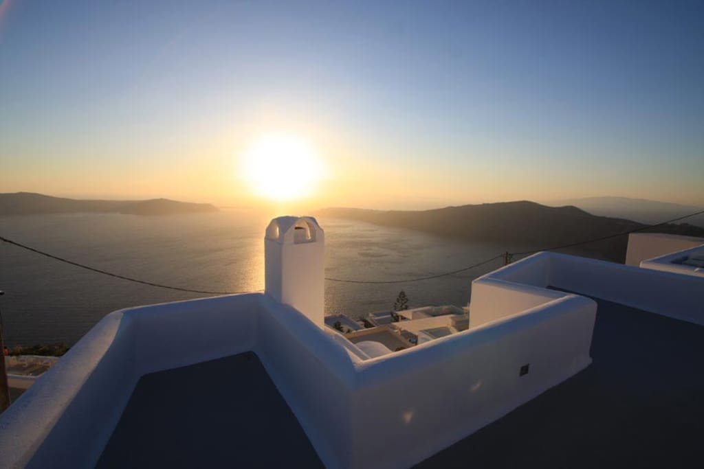 Panoramic view to the sea with sunset, caldera