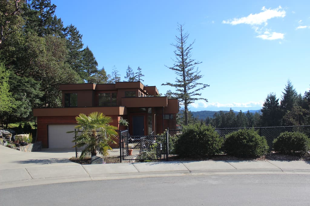West Coast Style Modern home perched atop beautiful Triangle Mountain