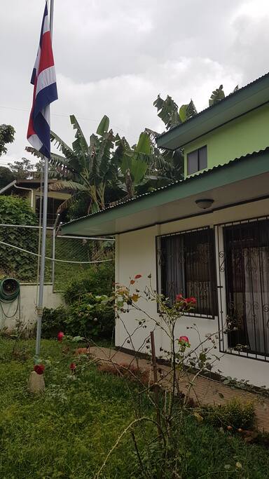 House Front. The second window on the left is the available room.