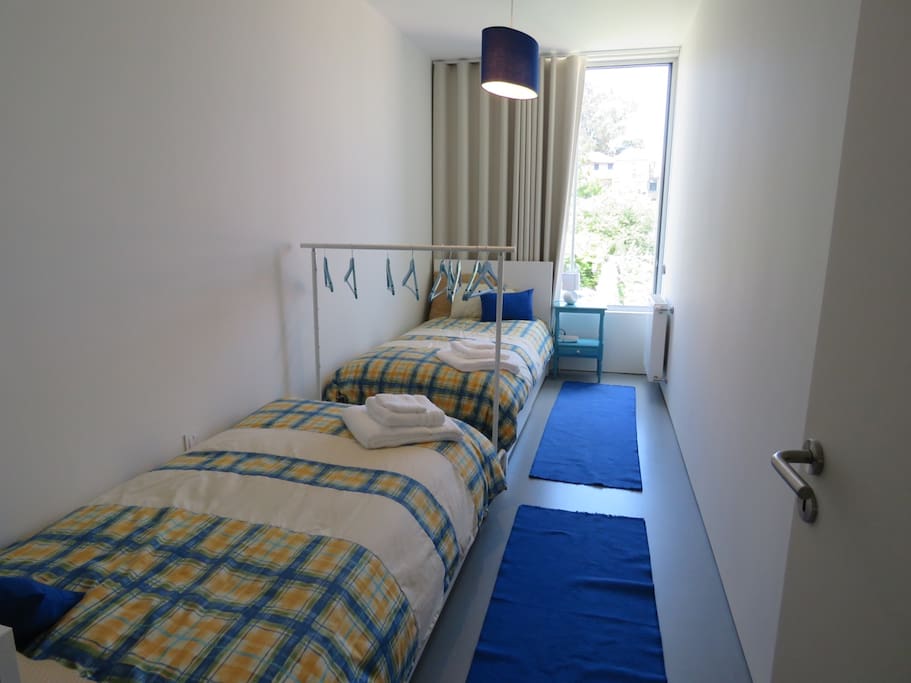 blue bedroom with large window