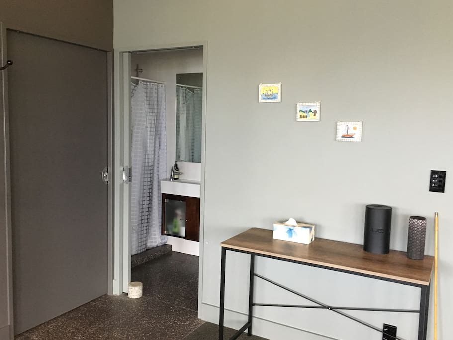 Entrance with private bathroom with shower.