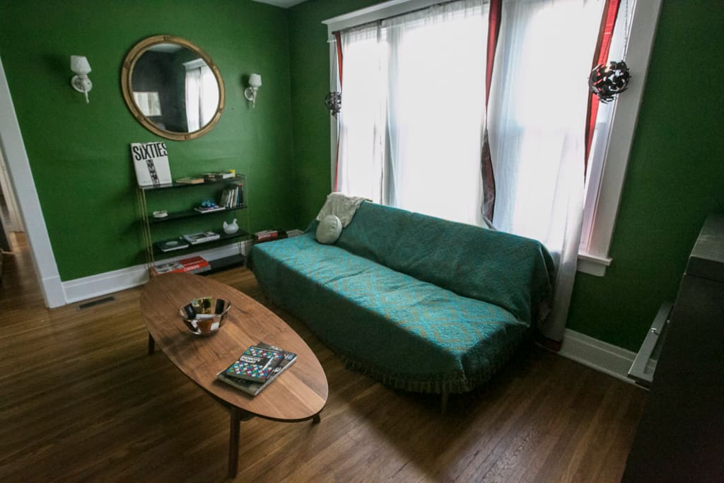 Living Room - This couch flattens to bed #4