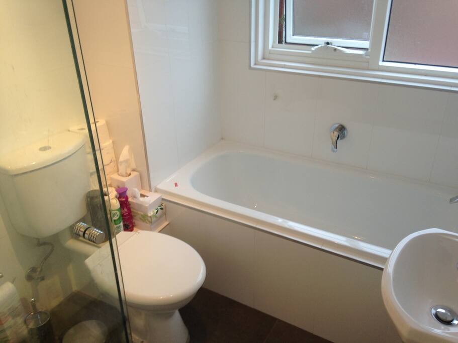 Small but very functional and clean bathroom for showering off after a day at the beach.