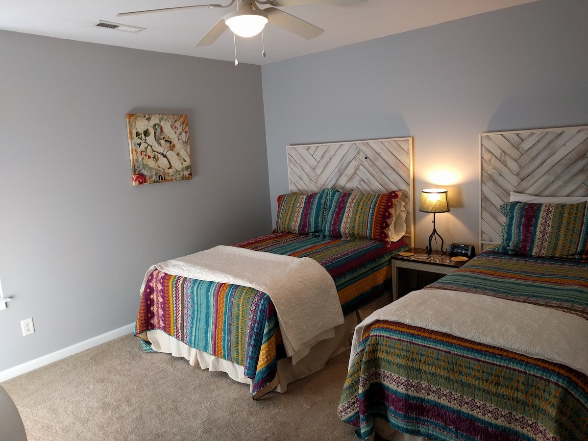 White room, a full and twin bed, we made the headboards.