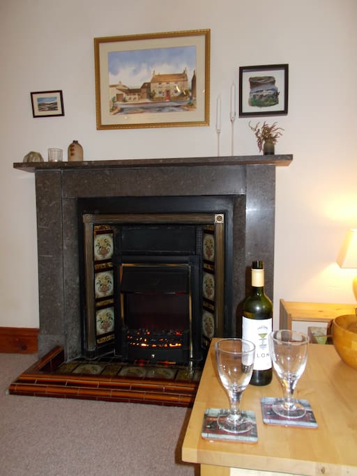 Original Dent marble fireplace with flame effect electric fire, for cosy evenings in.