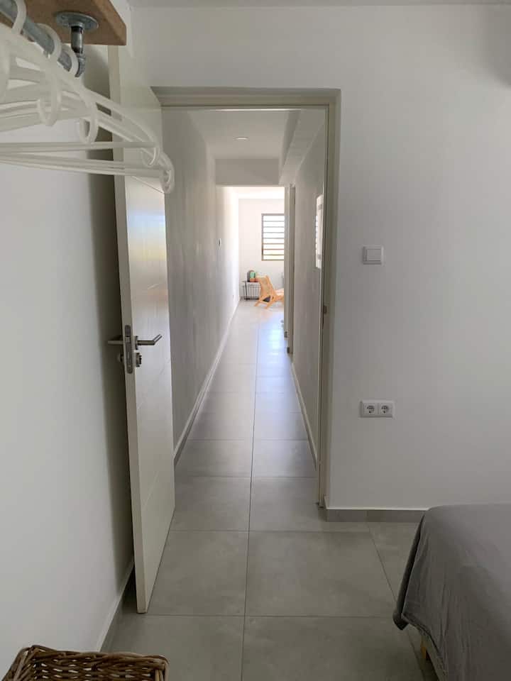 Walk from living space to bedrooms