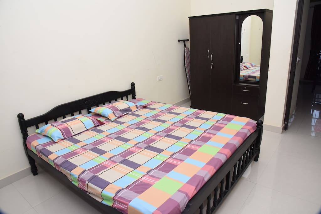 Bedroom
Double Bed with Wardrobe and Air-Conditioner