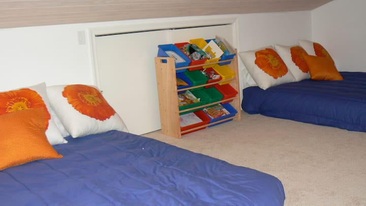 Dormitorio loft espacioso