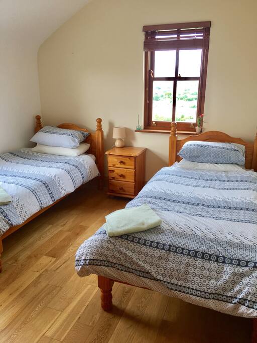 Twin room with two comfy single beds