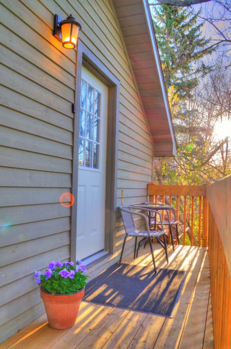 Your apartment entrance has a deck area with two chairs and a table. Great place to have your morning coffee
