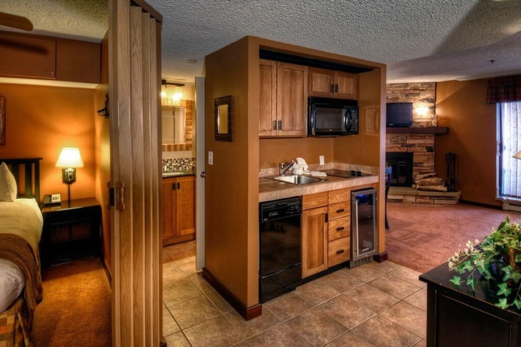 Prepare food in the efficiency kitchen.