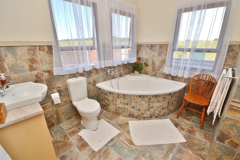 Guest bathroom including separate shower