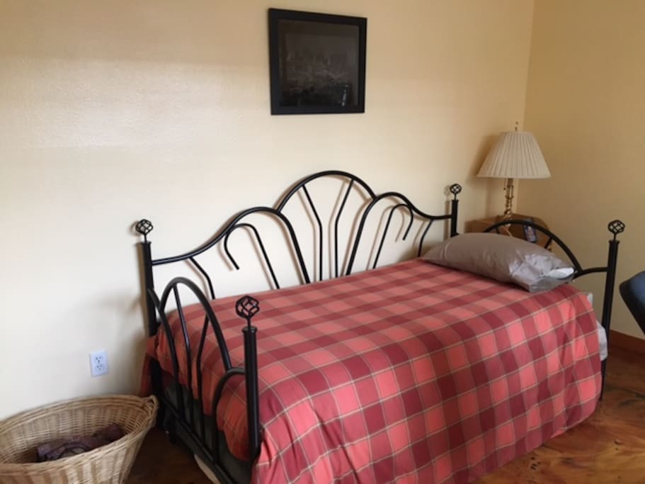 Bottom bed tucks away when not in use.