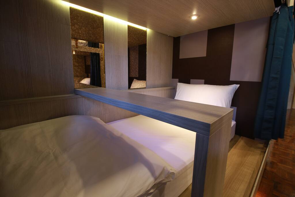 Each bed is inclusive with a slidable table, 2 sockets, 2 hangers.