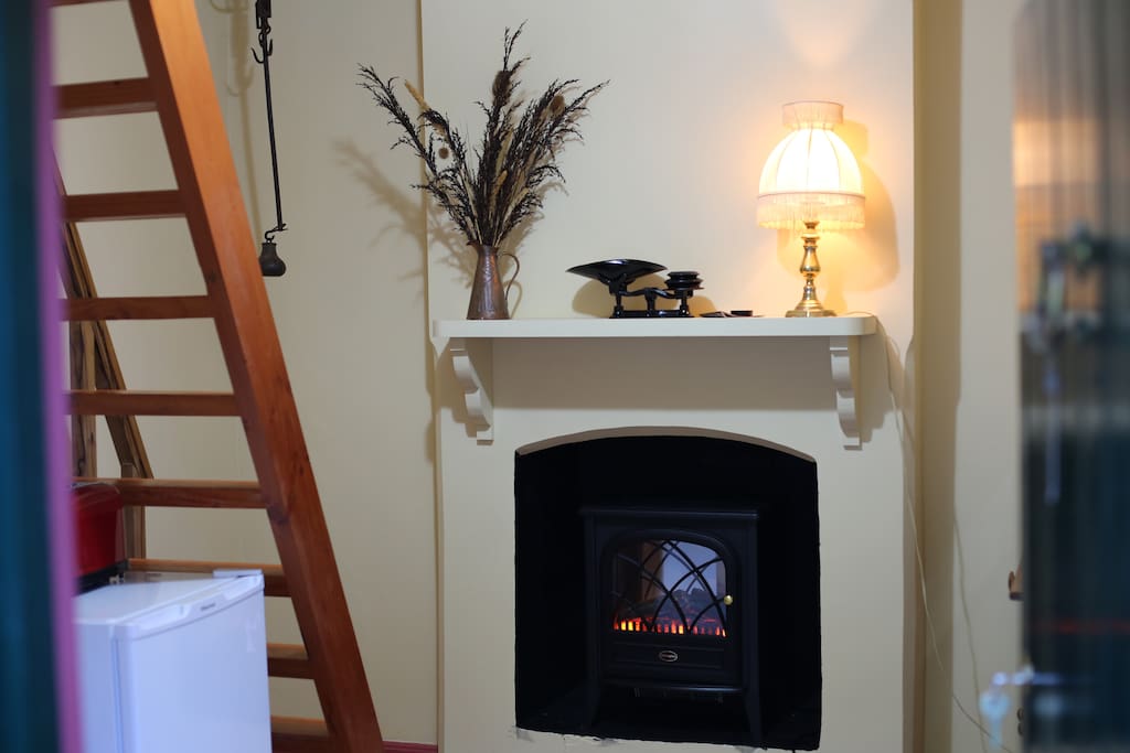 The fireplace in the sitting room
