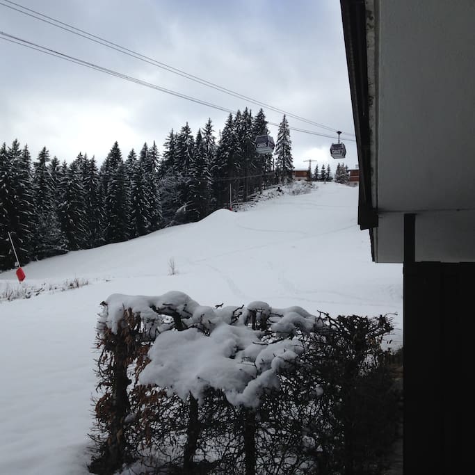 View of the Red run from the apartment. The run goes down into St Gervais.
