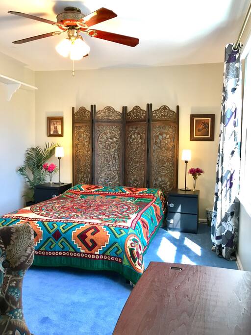 Sun-filled private guest bedroom