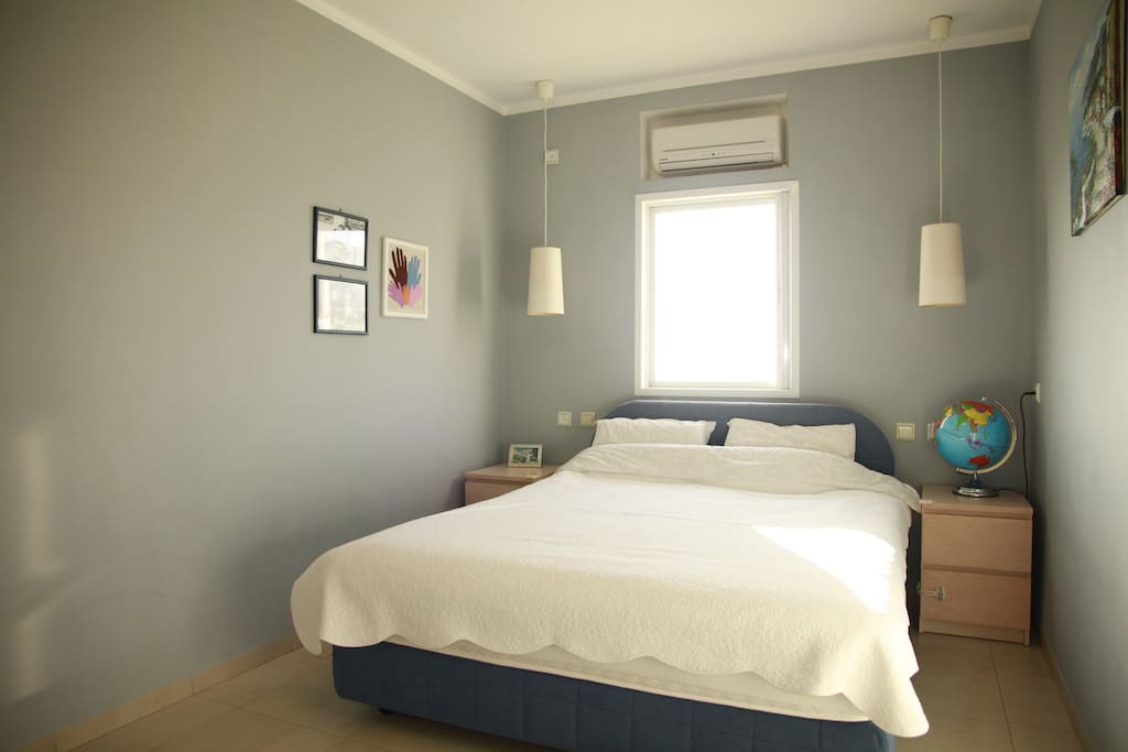 King size double bed in the master bedroom