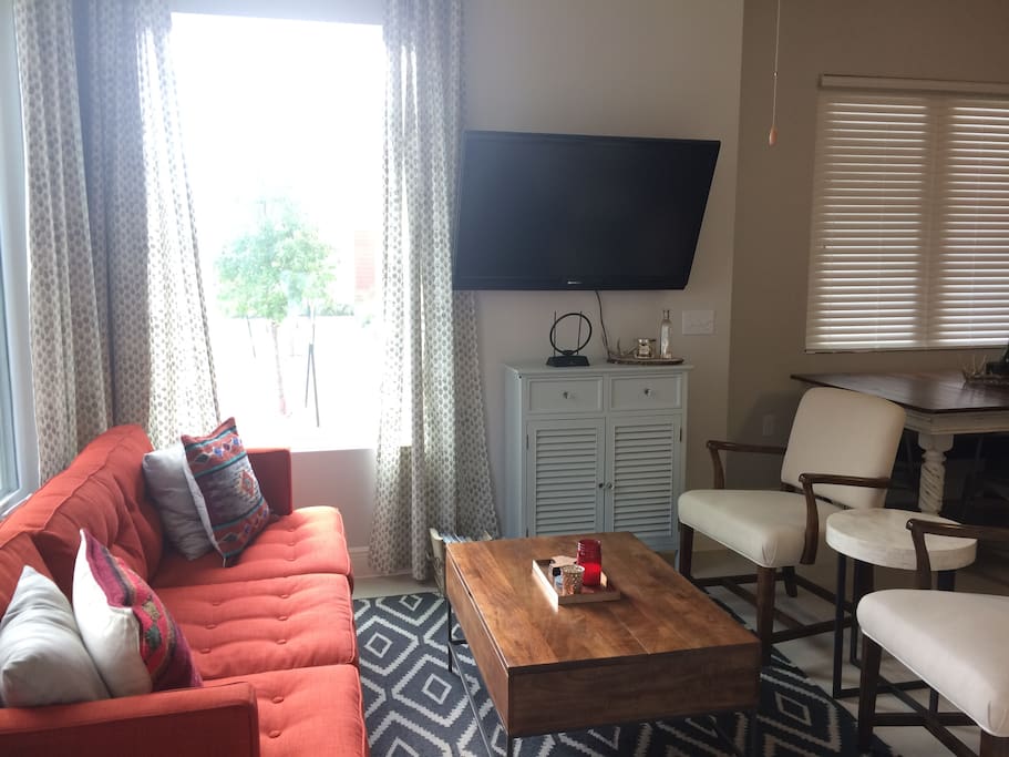 Wall-mounted tv in living room