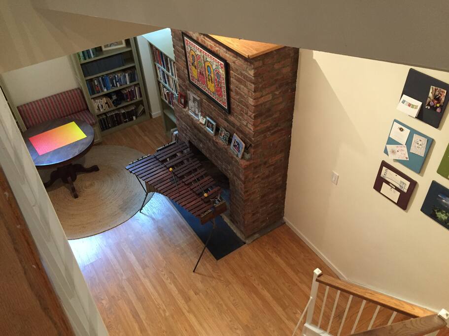 Downstairs library with fireplace - good for reading or crafting.