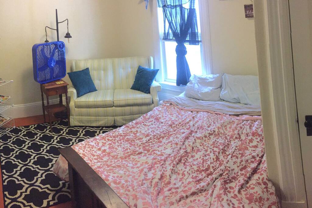 room comes complete with a fan, bed, lamp, coat rack,couch, mirror and dresser!