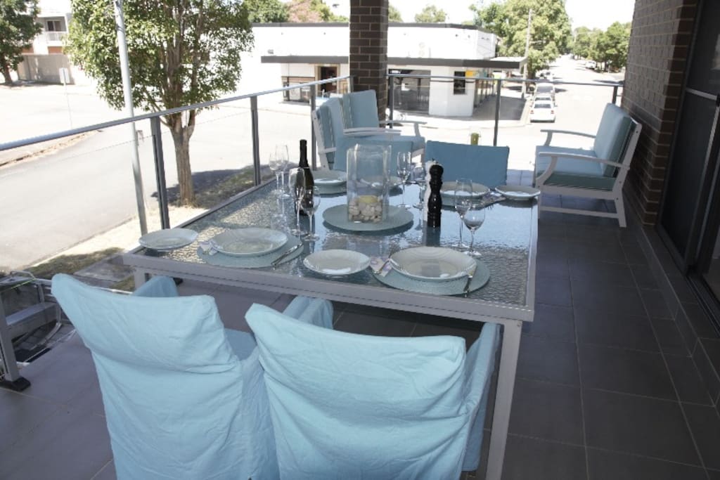 Top deck featuring table for 8, Hamptons outdoor lounge and BBQ ready for you to entertain