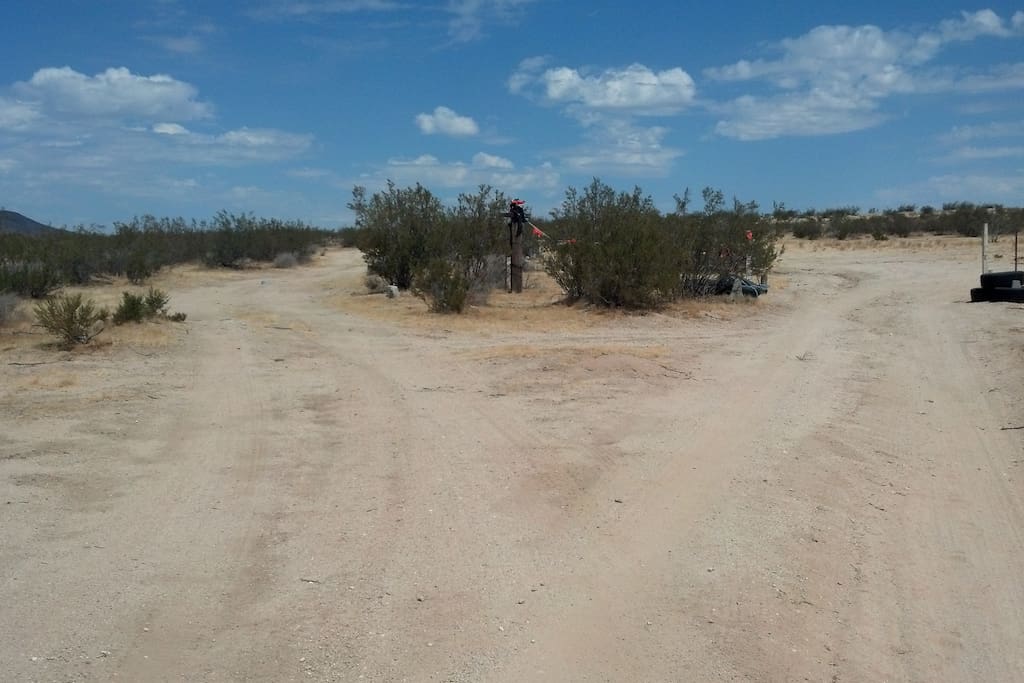 You Made It!! Made it To Our Fork in the Road!! Go Right! Right into the property. Left goes around the west side and past our back gate (your 2nd chance to enter) before disappearing into the desert. So...go right, or swing right later at the back gate.
Thanks