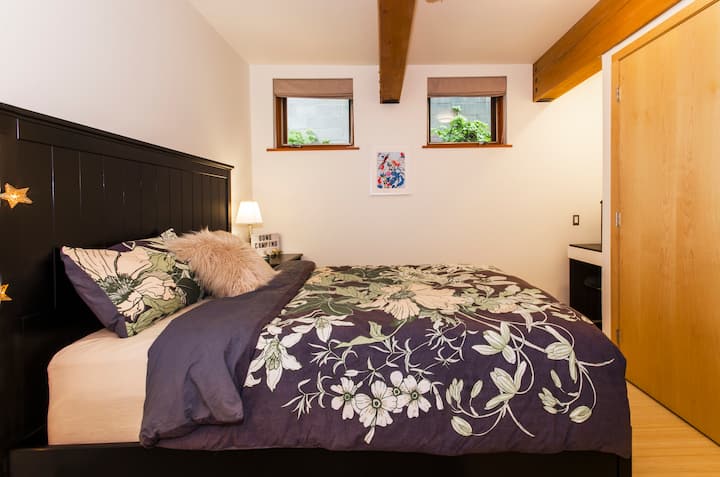 Downstairs bedroom with queen bed.