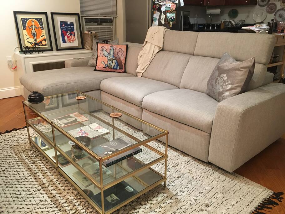 Living room - both sectionals recline to accommodate and extra person, and I provide sheets + pillows. Enjoy Netflix from a flat-screen TV, or enjoy food from one of the many neighborhood restaurants.