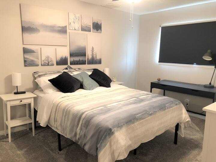 Queen Bedroom - ceiling fan, workspace desk, bedside lamps with several USB and Qi wireless charging capability