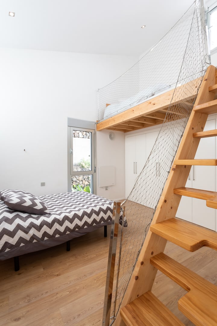 Bedroom with 2 double beds.
A bedroom with 2 double beds.