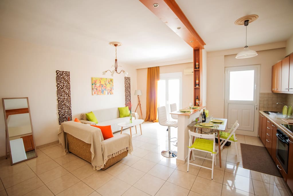 Living room and kitchen combined together in one comfy space