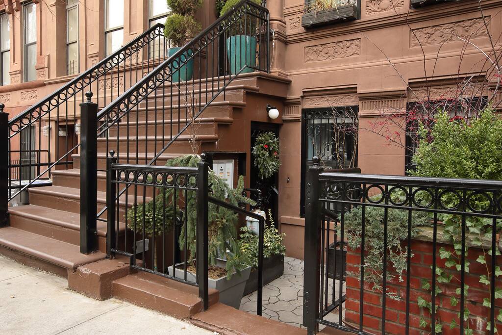 Winter view of apartment entrance.