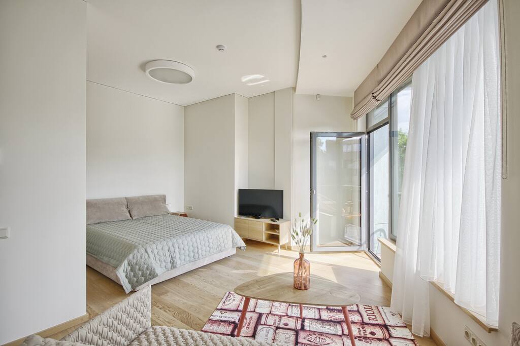 Spacious living room with bedroom