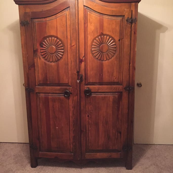 Armoire along with 2 closets offer plenty of storage for all your belongings!