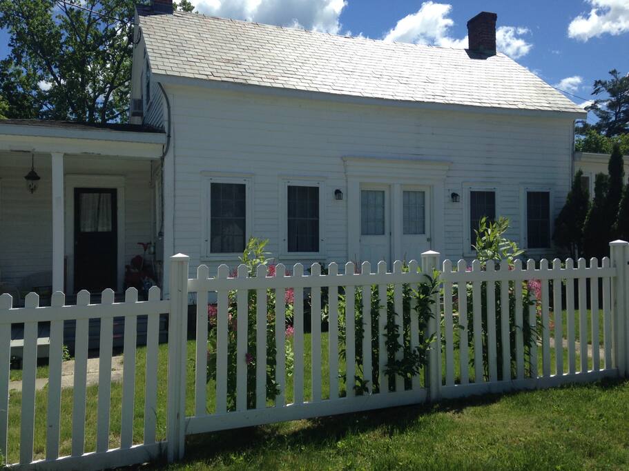 Apartment entrance is on the Far right side of the house