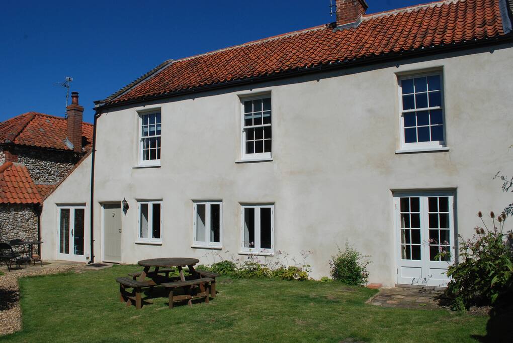 The house and garden.
