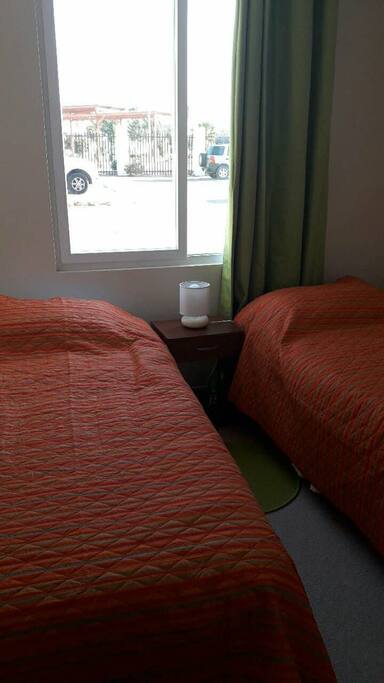 Dormitorio secundario con 2 camas