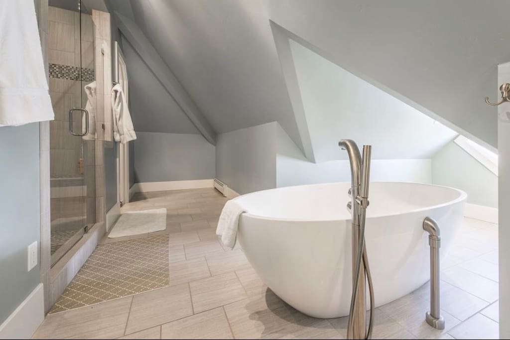 There is a window overlooking the mountain that you can look out as you soak in the tub