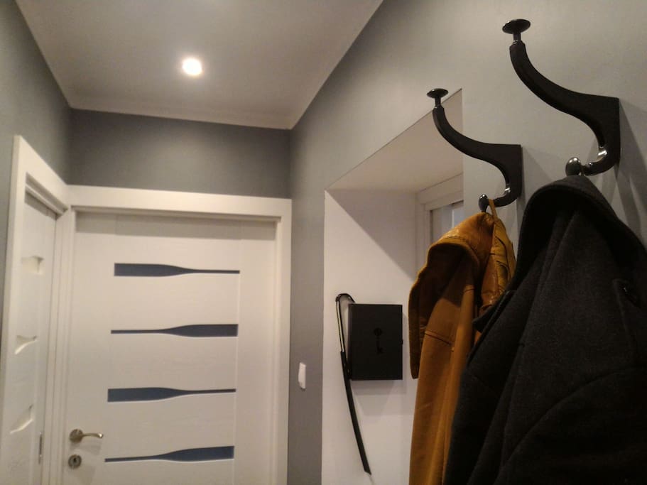 Light and clean corridor with hooks for your belongings