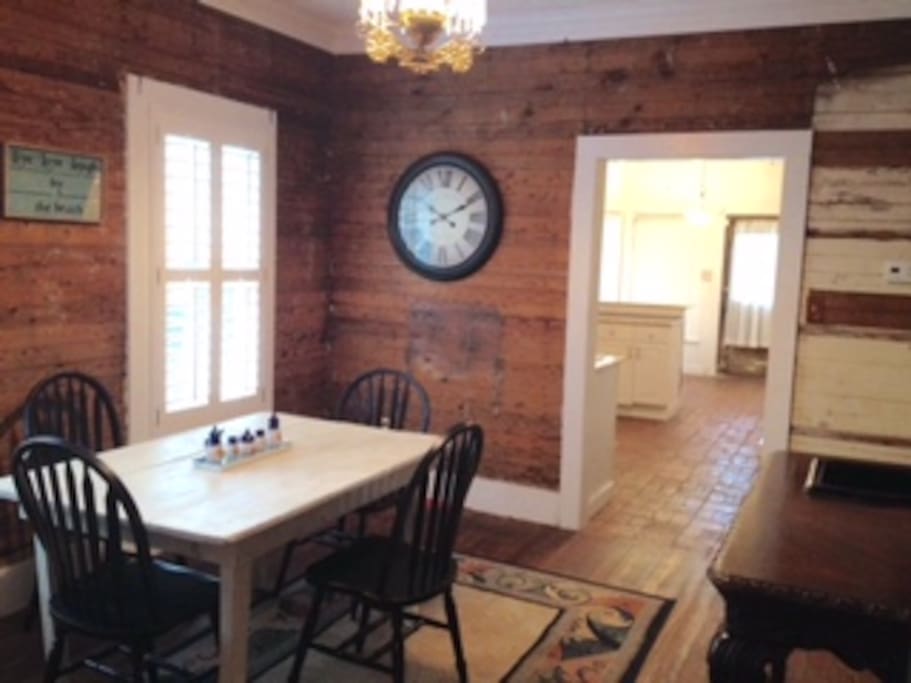 Dinning room with rustic farm table.