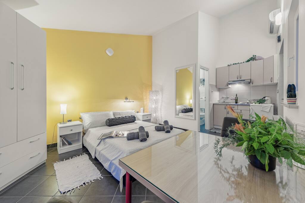 Bed and kitchen