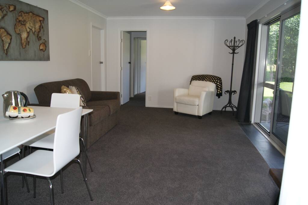 Large lounge with access on to a private patio
