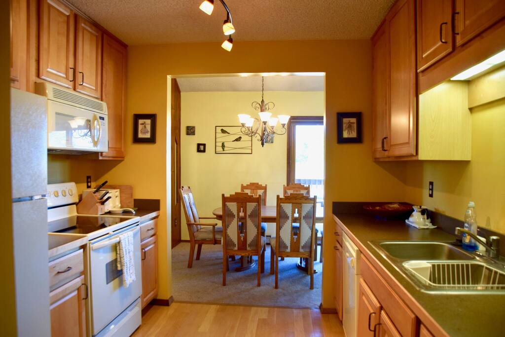 Fully equipped kitchen complete with basic condiments and spices.