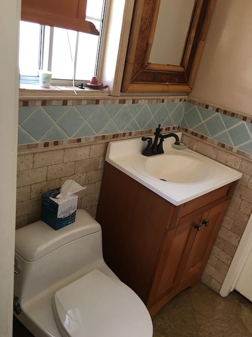 Private bathroom isn't attached to room and accessed from the outside of the main home.