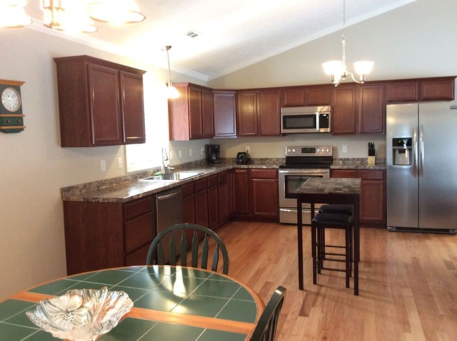 Large, open kitchen and dining with all amenities