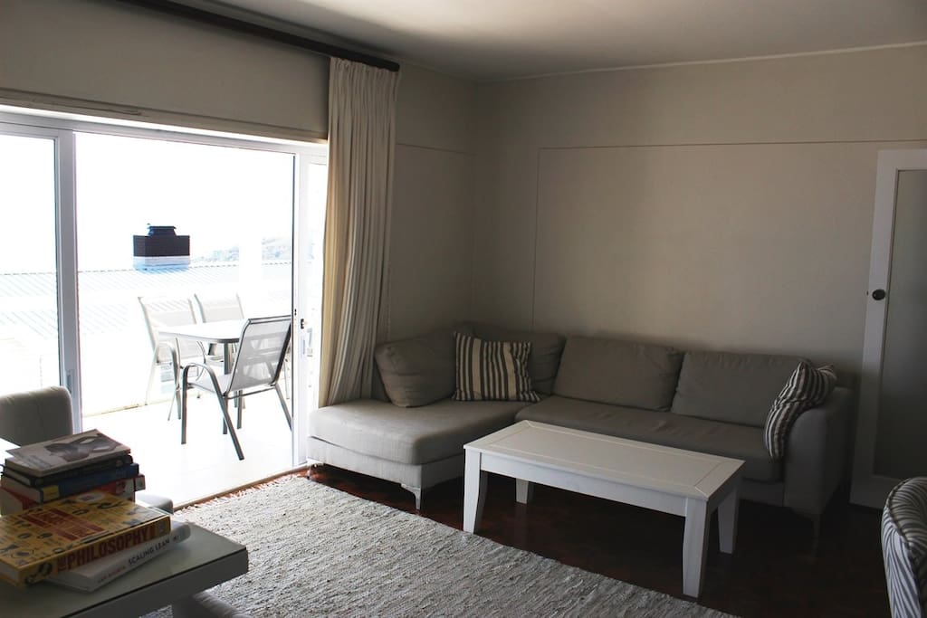 Lounge leading onto a deck